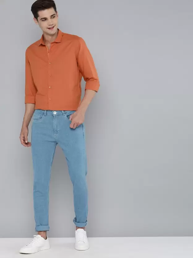 Orange Shirt with Blue Jeans