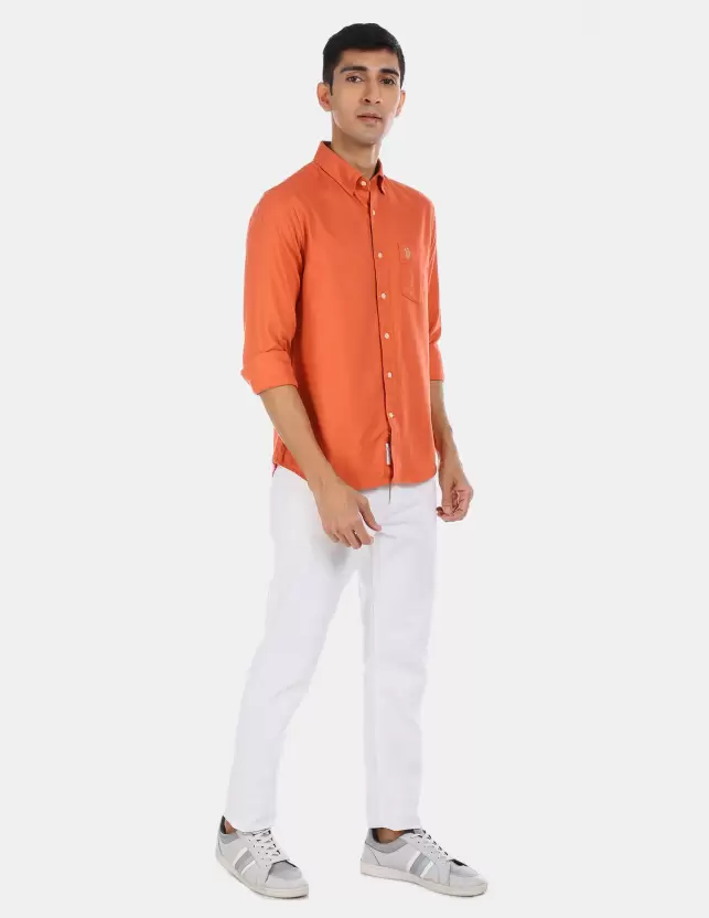 Orange Shirt with White Pants